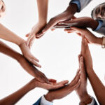 Diversity, circle hands and teamwork collaboration for success goal, and motivation and global company innovation. Zoom of business people, women and men workers in community group, support or trust