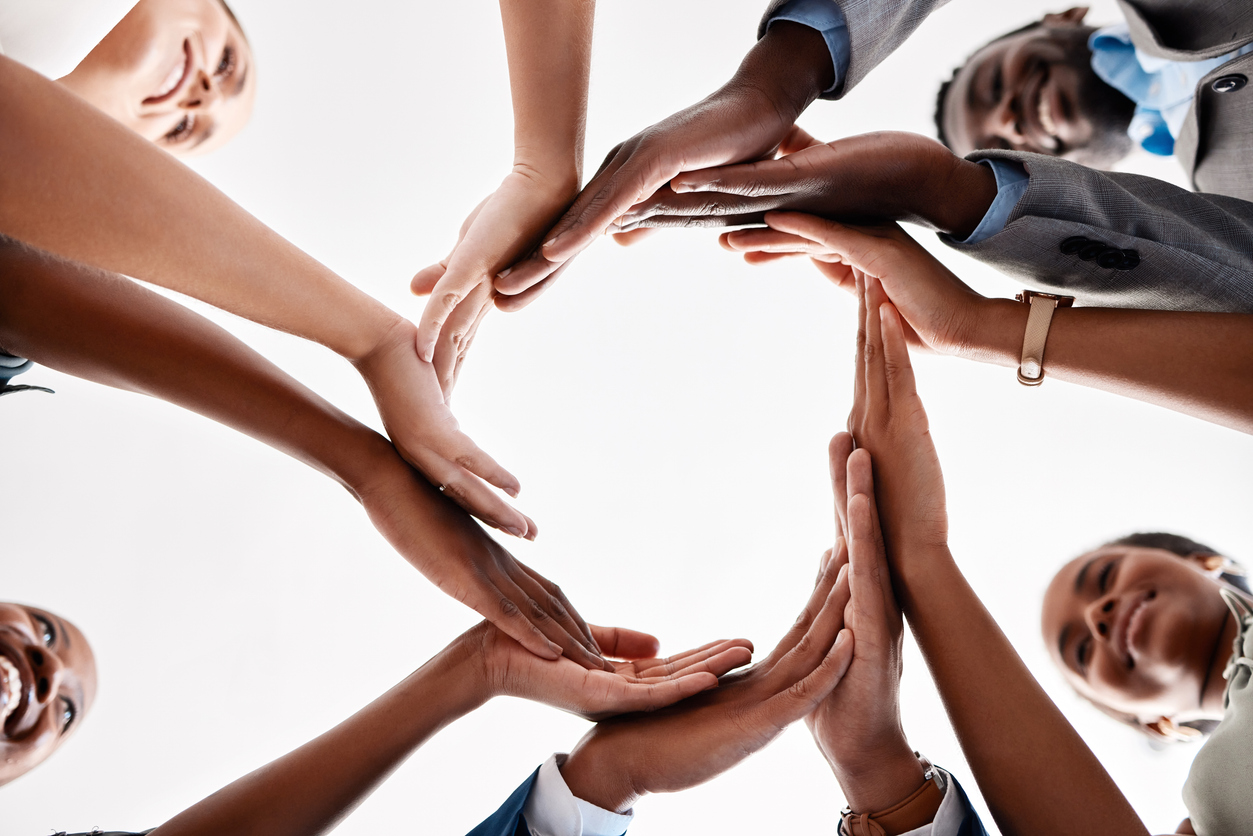 Diversity, circle hands and teamwork collaboration for success goal, and motivation and global company innovation. Zoom of business people, women and men workers in community group, support or trust